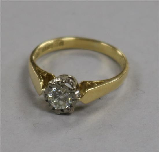 An 18ct gold and solitaire diamond ring, size J.